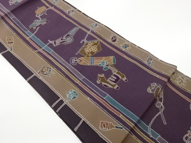 縮緬地小芥子に絵馬・独楽模様織出し名古屋帯